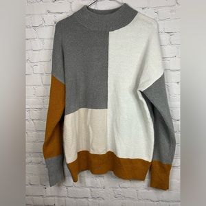 Studio B by Bobeau women’s sweater in color blocking. Great style! Size large